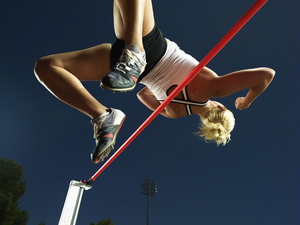High Jumper Jumping --- Image by © Royalty-Free/Corbis